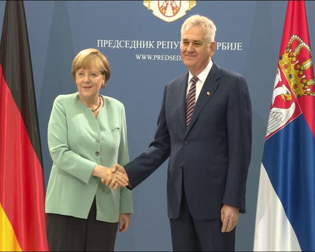 toma-merkel
